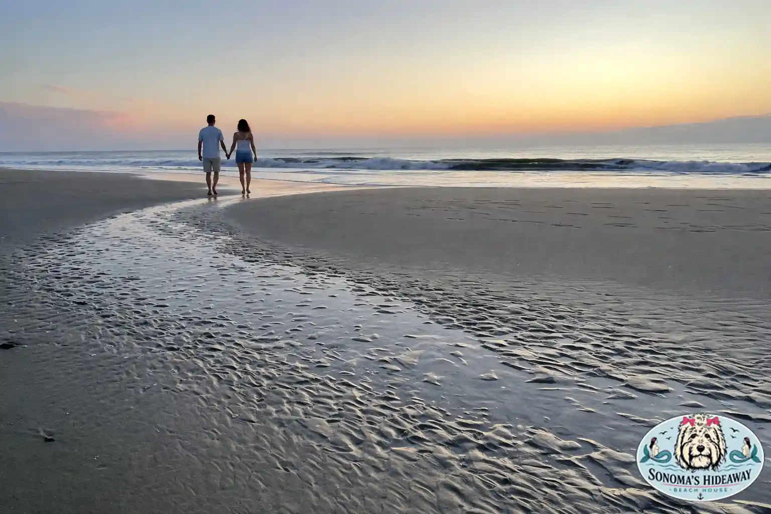 Couple walking along the beach at sunset in Corolla North Carolina with ocean waves, representing a relaxing Outer Banks vacation rental experience near the ocean
