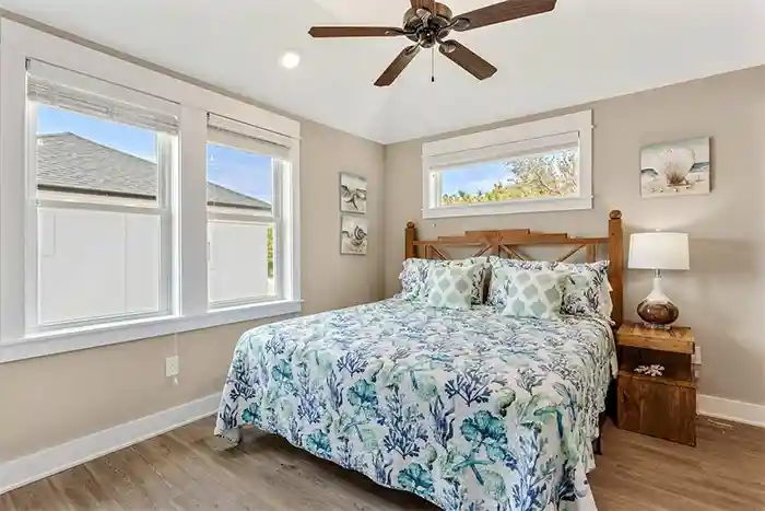 Second bedroom at Sonoma’s Hideaway in Corolla Outer Banks featuring a queen bed, coastal decor, private bathroom, and closet