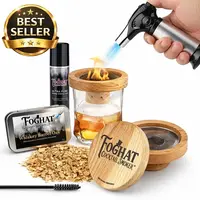 Foghat Cocktail Smoker Kit best seller image showing premium whiskey smoke infuser with torch, oak wood chips, and smoked bourbon cocktail glass.