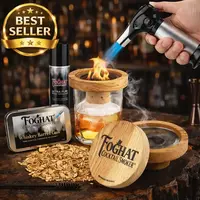 Foghat Cocktail Smoking Kit displayed on rustic bar with oak smoker, whiskey glass, torch igniting wood chips, and best seller badge.