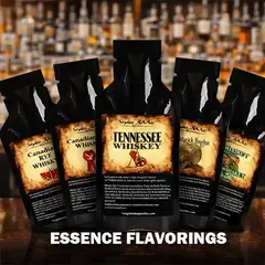 Variety pack of spirit essence flavorings including Tennessee Whiskey, Bourbon, Rye, and Irish Whiskey flavors displayed in front of a luxury bar backdrop.