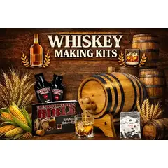 Whiskey making kits featuring a small oak aging barrel pouring whiskey into a glass, grain ingredients, stacked barrels, and home distilling supplies displayed on a rustic wooden background.