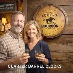 Couple holding whiskey glasses in a Kentucky bourbon bar standing next to a Cutler's Bourbon quarter barrel wall clock mounted on a rustic wood wall.