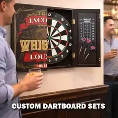 Custom whiskey lounge dartboard cabinet set mounted on a game room wall with one door open showing the dartboard inside, while people stand nearby drinking whiskey at a home bar.