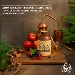 A classic moonshine jug featuring a brown glazed upper section, a cork stopper, and bold “XXX MOONSHINE” lettering on the light-colored lower half.