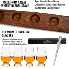 Close-up of real whisky barrel stave with char marks and grain patterns, shown with four Glencairn tasting glasses and pipette.