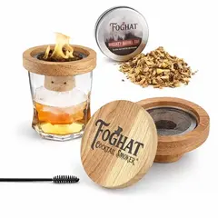 Foghat Cocktail Smoker oak wood lid with stainless steel mesh chamber displayed with whiskey barrel oak smoking chips and cleaning brush on white background.