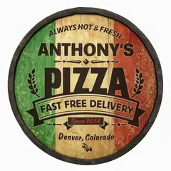 Close up of handmade barrel end pizza sign showing wood texture and bold PIZZA lettering