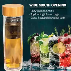 Liquor Quik® glass alcohol infuser bottle with bamboo lid and stainless steel infusion cage showing wide mouth opening for easy filling and cleaning.