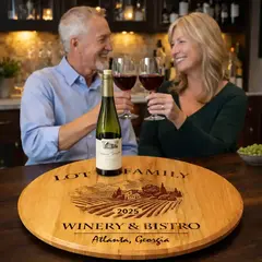 Personalized barrel head lazy susan with wine glasses and bottle used as a serving centerpiece for entertaining.