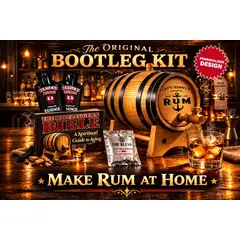 Personalized Bootleg Rum Making Kit featuring custom engraved American white oak barrel with working spigot pouring rum into glass, rum essence packets, and Bootlegger’s Bible guide on bar counter.