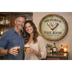 Personalized Michael’s Pool Room barrel head wall sign mounted above home bar with couple holding beer glasses.
