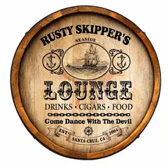 Rusty Skipper’s Lounge round wooden quarter barrel sign featuring tall ship illustration and anchor graphics.
