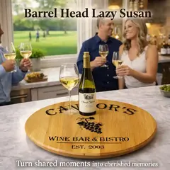 Wine barrel head lazy susan centerpiece on kitchen island with wine glasses and guests entertaining
