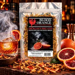 Dragon's Breath® Blood Orange scented oak wood chips for cocktail smokers, infused with sweet, tangy citrus aromatics. Premium smoking shavings displayed with fresh blood oranges, rich aromatic smoke, and a smoked whiskey cocktail. Ideal for bourbon, Old Fashioneds, Foghat cocktail smokers, and whiskey smoking kits.