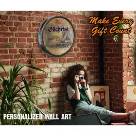 Woman sitting with scotch whiskey quarter barrel sign behind her