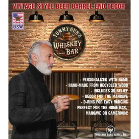 round wooden whiskey bar barrel end sign mounted on stone wall in home bar setting with gentleman and  product specs