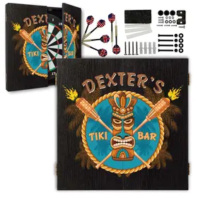 Personalized Tiki Bar dartboard cabinet set with custom name, tropical tiki mask design, included darts, mounting hardware, and accessories displayed on white background.