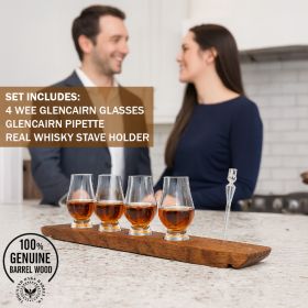 Whisky stave flight set on a kitchen counter with four Glencairn glasses, a Glencairn pipette, and real reclaimed whisky barrel stave holder.