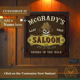 Personalized Western Saloon dartboard cabinet mounted on wood wall with custom name design and vintage rustic bar decor styling.