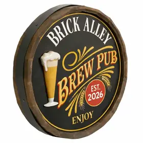 Charlie’s Brew Pub handmade quarter barrel sign showing angled 3D depth and raised beer glass relief.