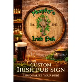 Custom Murphy’s Irish Pub quarter barrel sign featuring Celtic cross design and personalized pub name, 20–21 inch round handmade wooden barrel head wall decor displayed in Irish pub bar setting with Guinness beer and whiskey glass.