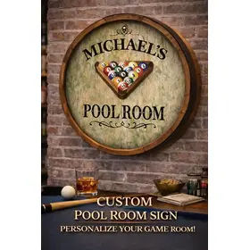 Close-up of Michael’s Pool Room quarter barrel sign mounted on brick wall highlighting 3D relief and handcrafted wood detail.