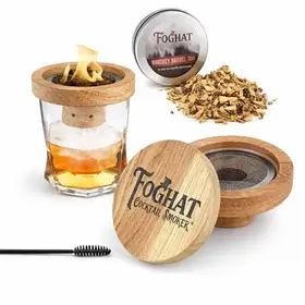 Foghat Cocktail Smoker oak wood lid with stainless steel mesh chamber displayed with whiskey barrel oak smoking chips and cleaning brush on white background.