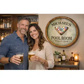 Personalized Michael’s Pool Room barrel head wall sign mounted above home bar with couple holding beer glasses.