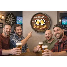 Four friends holding beers in front of personalized quarter barrel man cave sign with 3D relief beer mugs
