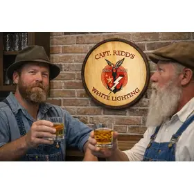 Handmade White Lightning whiskey barrel head wall decor featured in man cave setting with two men raising glasses of bourbon.