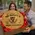 Irish whiskey barrel head lazy susan personalized gift being opened by couple with red gift wrapping