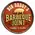 Front view of handmade personalized BBQ barrel sign with bold BARBEQUE JOINT lettering