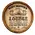 Rusty Skipper’s Lounge round wooden quarter barrel sign featuring tall ship illustration and anchor graphics.