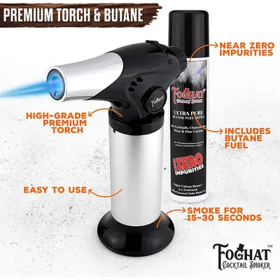 Foghat premium culinary torch with adjustable blue flame shown next to ultra-pure butane fuel refill.