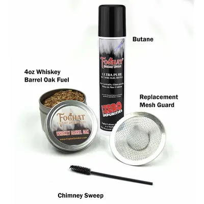 Foghat Cocktail Smoker Refill Kit with whiskey barrel oak smoking fuel tin, ultra pure butane canister, stainless steel replacement mesh guard, and chimney sweep cleaning brush on white background.