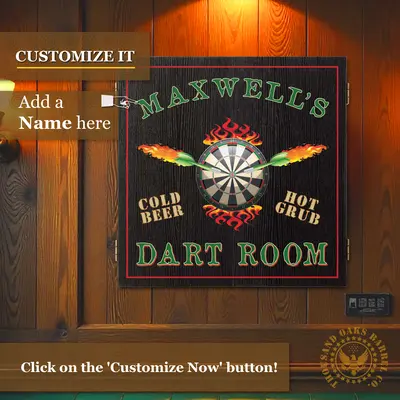 Close-up lifestyle image of a custom dartboard cabinet reading “Maxwell’s Dart Room,” showing a family playing darts in a home game room setting.
