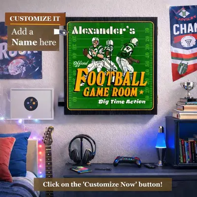 Personalized football game room dartboard cabinet mounted on teen bedroom wall with custom name design.