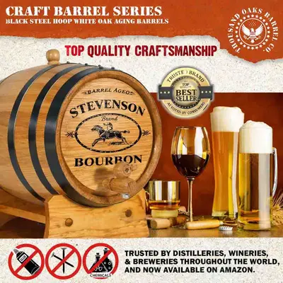 Close up of American white oak bourbon aging barrel with black steel hoops and wooden stand