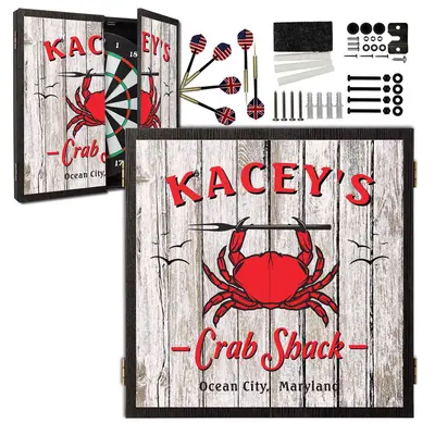 Personalized Crab Shack dartboard cabinet set with bristle dartboard, steel tip darts, and mounting hardware, ideal for beach house, coastal bar, or ocean-themed game room.