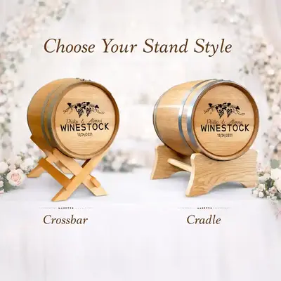 Personalized wedding barrel with engraved names and wedding date displayed on two stand options including crossbar stand and cradle stand for rustic wedding decor.
