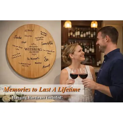 Personalized wine barrel head wedding guestbook keepsake hanging on wall as home decor memory from the wedding day.