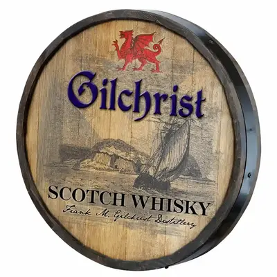Close up of Gilchrist Scotch Whisky barrel end sign showing wood grain and detailed artwork