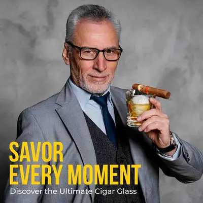 Luxury whiskey cigar glass held by stylish man enjoying bourbon and cigar.