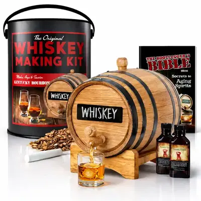 Man Can Original Whiskey Making Kit featuring handcrafted oak aging barrel pouring whiskey into a glass, gift can packaging, Bootlegger’s Bible guide, and flavoring bottles on a clean white background.