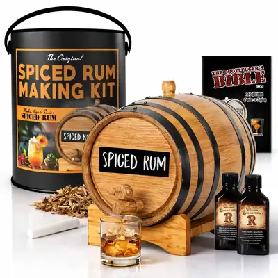 Man Can Original Spiced Rum Making Kit featuring American white oak aging barrel labeled Spiced Rum, essence bottles, Bootlegger’s Bible guide, gift can packaging, and rum glass on white background.