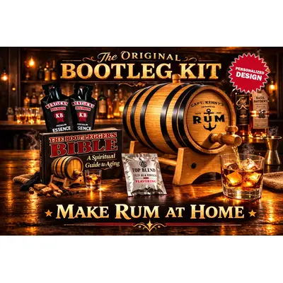 Personalized Bootleg Rum Making Kit featuring custom engraved American white oak barrel with working spigot pouring rum into glass, rum essence packets, and Bootlegger’s Bible guide on bar counter.