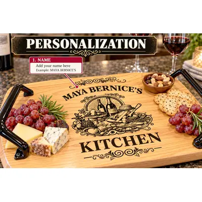 Close-up of personalized oak kitchen serving tray with custom name engraving, decorative wine and food illustration, black wrought iron handles, and charcuterie.