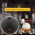 Foghat food-grade silicone ice ball mold with slow-melting ice sphere in whiskey glass