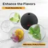 Foghat ice ball mold creating decorative ice spheres with herbs, fruit, and flowers inside
